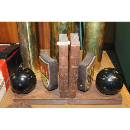 132 - Pair of German bookends with Koln crests and mounted cannonballs.