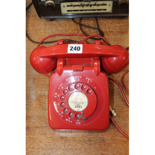 240 - Vintage red telephone.