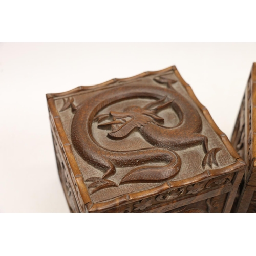 10 - Pair of carved dragon decorated oriental boxes. 13cm.