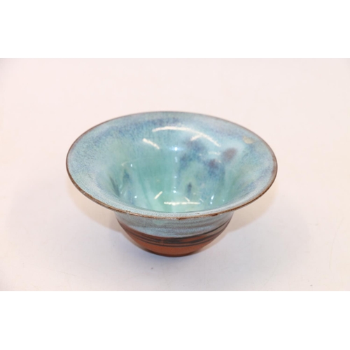 100K - Studio pottery drip glazed bowl, signed Pens Pots to base, 14cm diameter.