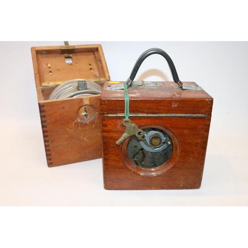 15 - Two vintage racing pigeon timing clocks.