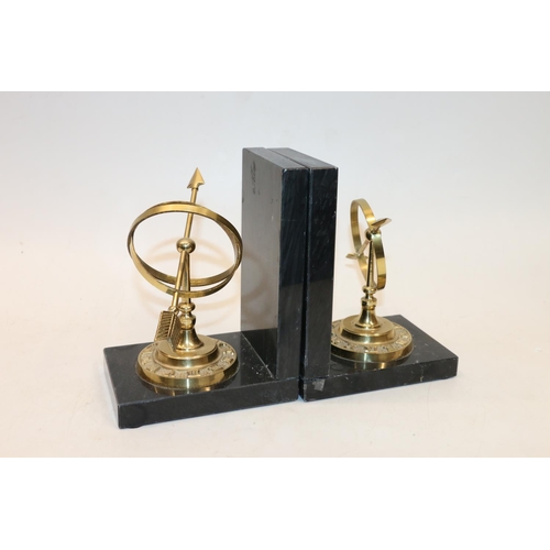 16 - Pair of marble bookends mounted with brass sun dials. 16.5cm.