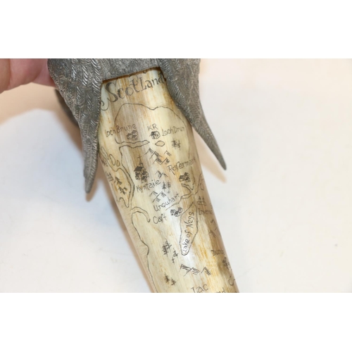 19 - Carved cow horn with scrimshaw decoration showing a map of Scotland.