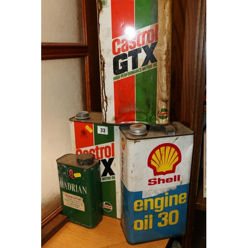 33 - Two vintage Castrol oil cans, a Shell oil can and a Hadrian varnish tin.  (4)