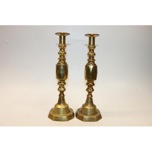 36 - Pair of brass 'Queen of Diamonds' style candlesticks. 30cm.