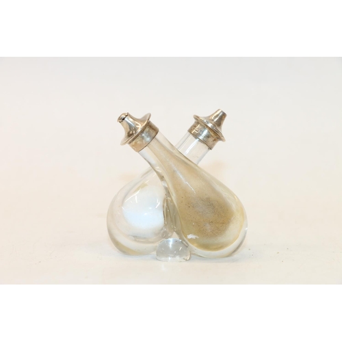 41 - Entwined glass salt and pepper shakers with silver tops. 7cm.
