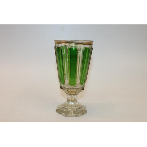 53 - Bohemian green and gilt flash cut footed glass. 16cm.