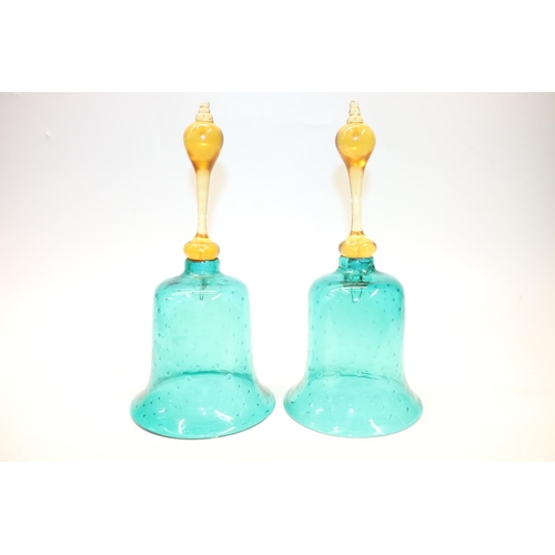 57 - Pair of green and amber glass bells. 30cm.