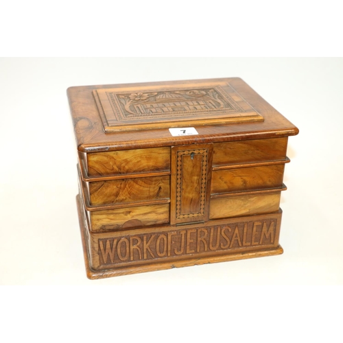 7 - Carved treen jewellery box bearing 'Work of Jerusalem' carved to the front. 18cm.