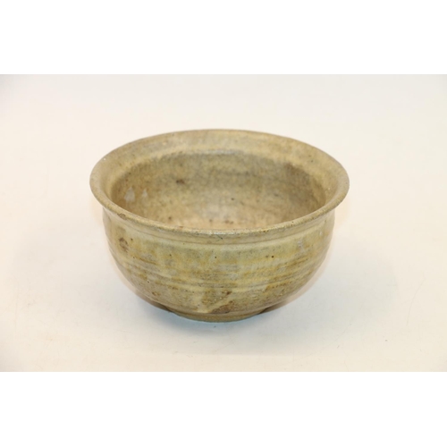 76 - Studio pottery drip glazed bowl, 16cm diameter.