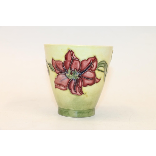 88 - Moorcroft floral decorated beaker vase, 9cm.