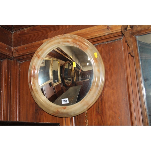 698 - Alabaster round framed wall mirror, 39cm diameter.