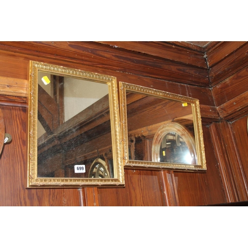 699 - Pair of gilt framed rectangular wall mirrors, 37cm x 30cm.