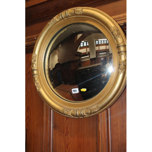 701 - Gilt framed bevel edged oval wall mirror.