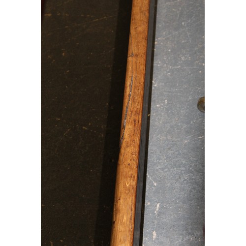 404 - 17th century style oak refectory table, with fixed plank top, above a carved frieze, raised on turne... 