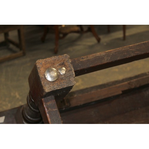 404 - 17th century style oak refectory table, with fixed plank top, above a carved frieze, raised on turne... 