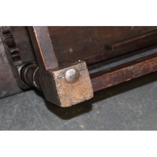 404 - 17th century style oak refectory table, with fixed plank top, above a carved frieze, raised on turne... 