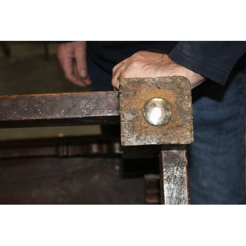 404 - 17th century style oak refectory table, with fixed plank top, above a carved frieze, raised on turne... 