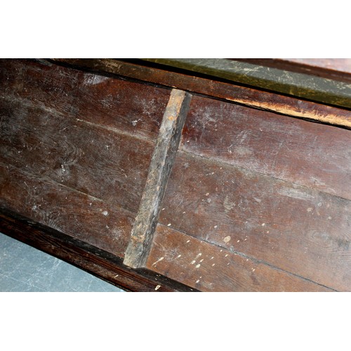 404 - 17th century style oak refectory table, with fixed plank top, above a carved frieze, raised on turne... 