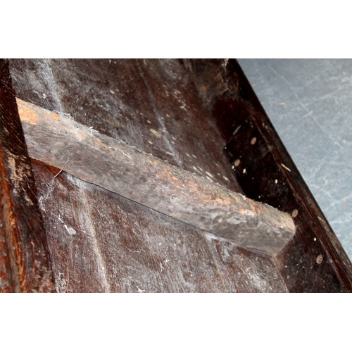 404 - 17th century style oak refectory table, with fixed plank top, above a carved frieze, raised on turne... 