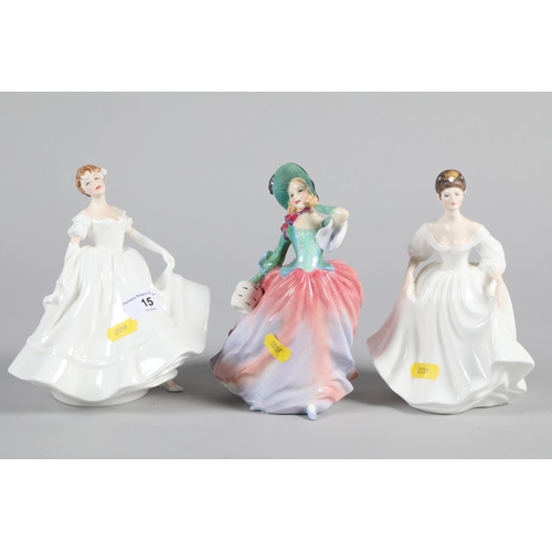 15 - Three Royal Doulton porcelain figures; Angela HN2389; Nancy HN2955 & Autumn Breezes HN1911 (3)