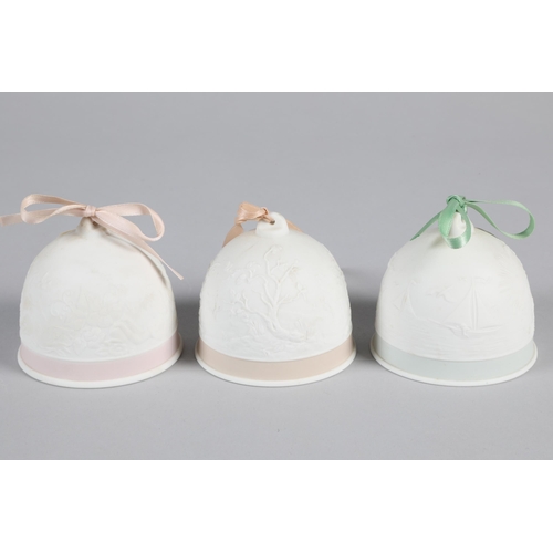 2 - Set of three Lladro porcelain bells; 7.5cm high