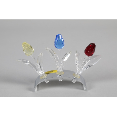 26 - Swarovski crystal model of three tulips on chrome base; 11cm high