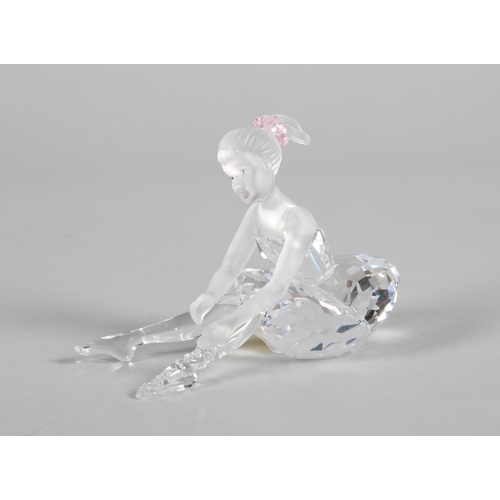 28 - Swarovski crystal glass figure; Seated Ballerina; 7cm high