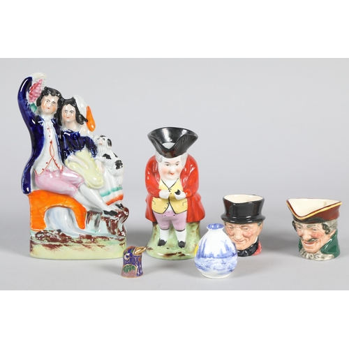 52 - Staffordshire flat back figure; together with two small Royal Doulton character jugs and other decor... 