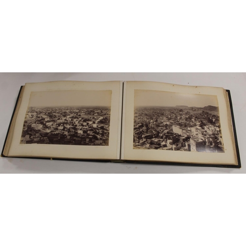 31 - Photographs. India. Rubbed dark morocco oblong folio album cont. over 65 Victorian photographs ... 