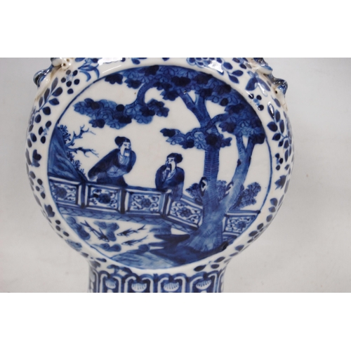 170 - Chinese blue and white Kangxi-style flask with central panel bearing figures in a garden scene in al... 