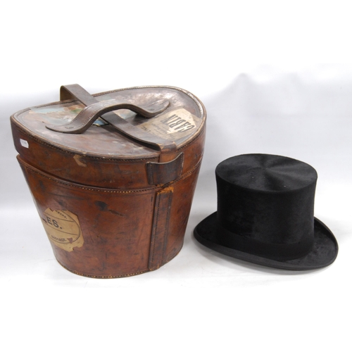 180 - Black silk top hat retailed by Tress & Co., London, internal diameter 15.5cm x 19.5cm, with orig... 