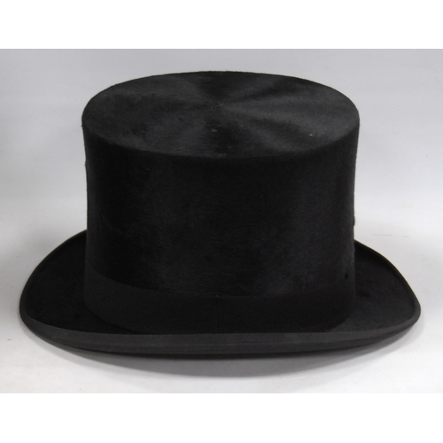 180 - Black silk top hat retailed by Tress & Co., London, internal diameter 15.5cm x 19.5cm, with orig... 