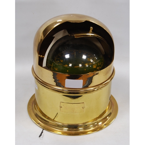 181 - Nauticalia: gimble liquid compass enclosed in a brass binnacle case, drilled to the base for mountin... 