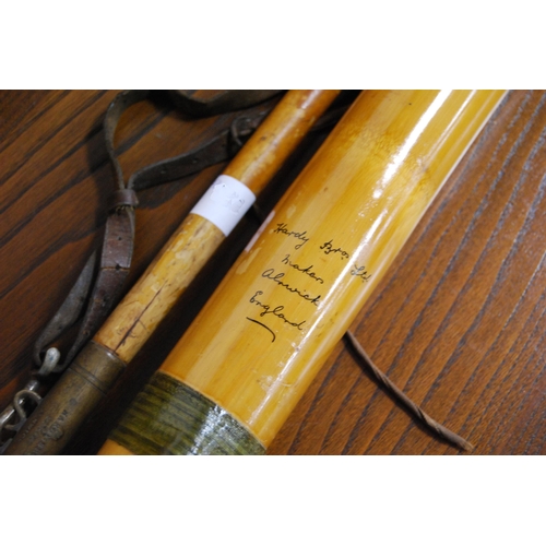 197 - Fishing interest: Hardy Bros fishing gaff with brass mounts and carry strap, a Hardy Bros bamboo rod... 