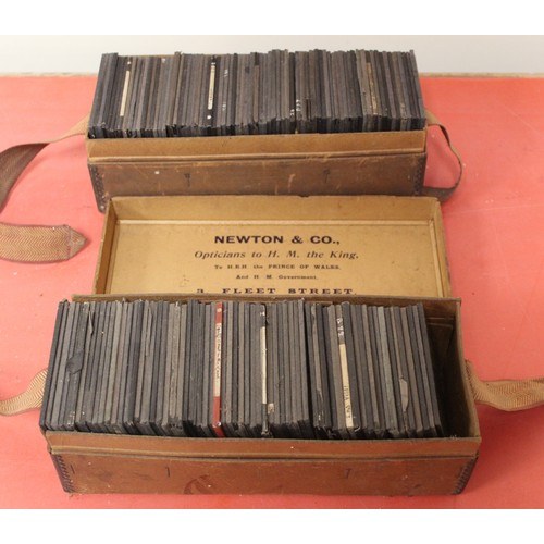 81 - Two boxes of approx 100 mixed monochrome & colour glass slides many by Newton & Co, comprisi... 