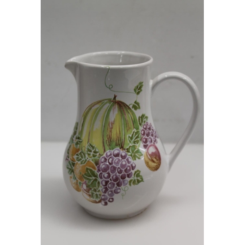 100A - Buchan of Portobello fruit decorated jug, 19cm.