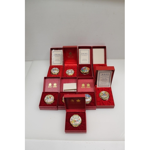 100B - Nine boxed Halcyon Days enamelled Christmas trinket boxes, (9).