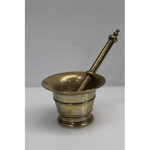 23 - Bronze pestle & mortar, 13cm diameter.