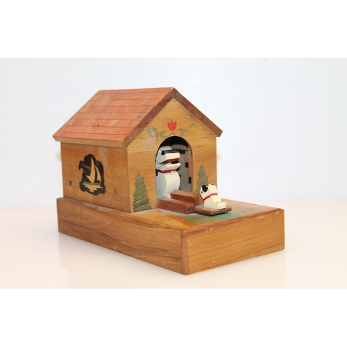 3 - Novelty treen puzzle box in the form of a dog and puppy in doghouse, 18cm.