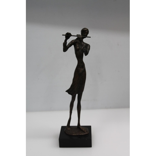 33 - Bronzed sculpture of a flute player mounted on plinth base, 35cm.