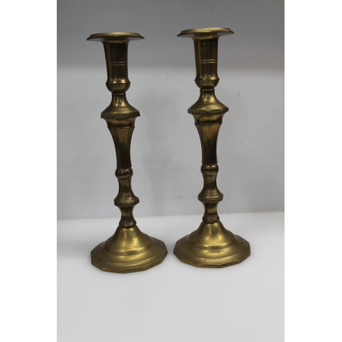 35 - Pair of brass candlesticks, 38cm.