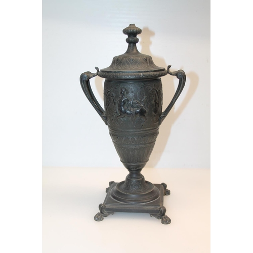 44 - Cast metal urn decorated with mythical centaur, 33cm.