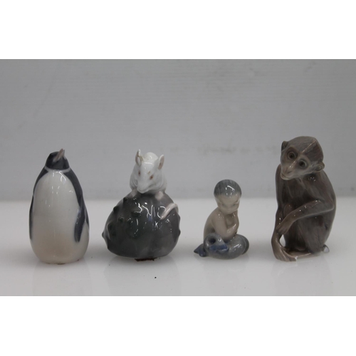 63 - Four small Royal Copenhagen models, monkey, mouse, penguin & mermaid.  (4)