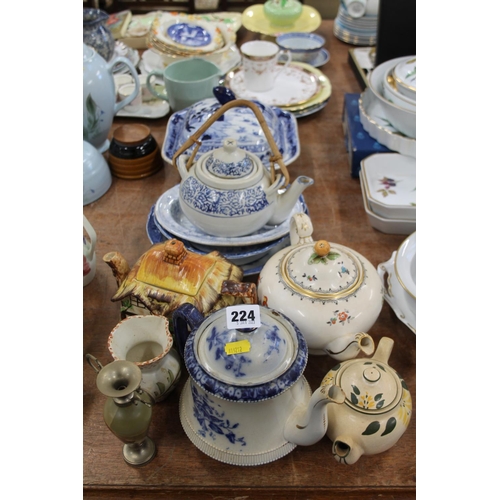 224 - Blue and white china, teapots, cottage ware teapots, etc.