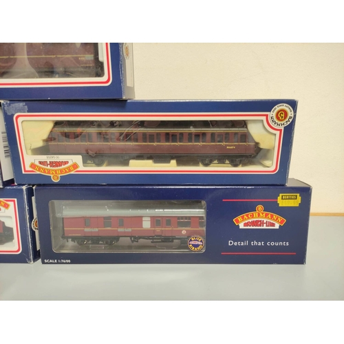 61 - Five boxed Bachmann OO gauge railway carriages comprising of 57' BR MK1 Suburban Crimson 34-600... 