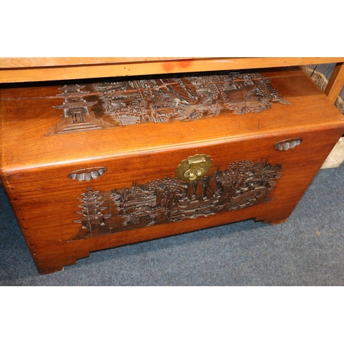 726 - Heavily carved oriental blanket box, 100cm x 55cm.