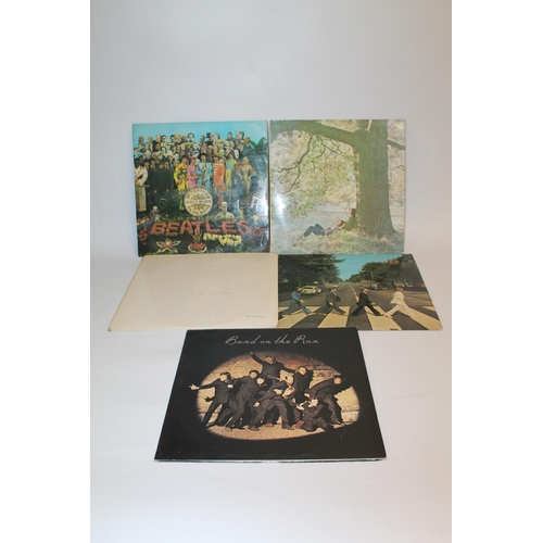 297 - Collection of Beatles and Beatles related records to include The White Album number 0416051 with ins... 