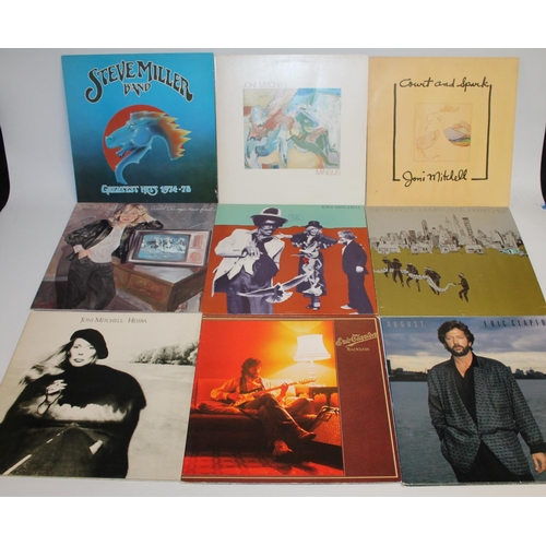 305 - Collection of mainly 70's records to include a collection of Joni Mitchell, Eric Clapton, Bob Seger,... 