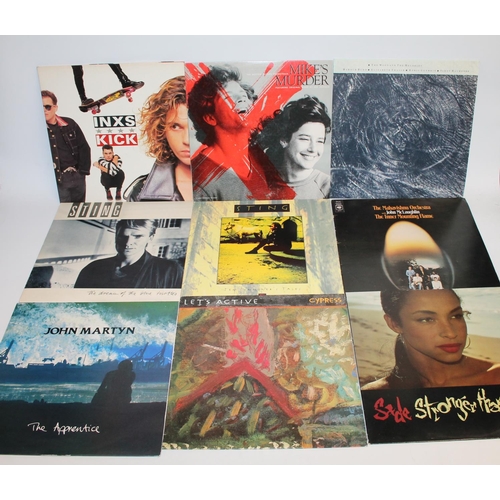 309 - Large collection of mixed records mainly 80's to include Falco, Sting, Bryan Adams, INXS, etc (40)